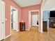 Open hallway with hardwood floors and neutral walls at 114 Hardwood Ln, Canton, GA 30115