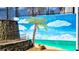 Outdoor mural of beach with palm trees against a bright blue sky on the exterior wall at 114 Hardwood Ln, Canton, GA 30115