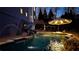 Swimming pool features a slide and a water fountain feature, surrounded by a brick patio at 114 Hardwood Ln, Canton, GA 30115