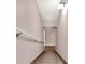 Carpeted stairs leading to a basement with a wooden handrail at 114 Hardwood Ln, Canton, GA 30115