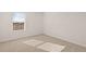 Bedroom featuring a window and neutral carpeting at 1622 Palladian Way, Lithonia, GA 30058