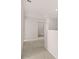 Upstairs hallway featuring plush carpeting and a view into another room at 1622 Palladian Way, Lithonia, GA 30058