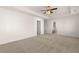 Spacious bedroom with plush carpet and ensuite bath access at 1622 Palladian Way, Lithonia, GA 30058