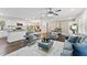 Sunlit living room features stylish furnishings, hardwood floors, and an open layout for modern living at 3263 Dodson Dr, Atlanta, GA 30344