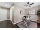 Functional office with a decorative ceiling fan, desk, and ample lighting for a productive workspace at 3263 Dodson Dr, Atlanta, GA 30344