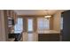 Well-lit kitchen featuring a gas range, stainless steel appliances, neutral cabinets and countertops at 5763 Dexters Mill Pl, Buford, GA 30518
