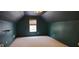 Large room with carpet flooring, window, and interesting ceiling texture at 5763 Dexters Mill Pl, Buford, GA 30518