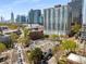 High-angle view showing property, city skyline, residential street and neighborhood at 1078 Piedmont Ne Ave # 203, Atlanta, GA 30309