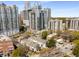Stunning aerial view of the property showcasing the neighborhood, surrounding buildings and city skyline at 1078 Piedmont Ne Ave # 203, Atlanta, GA 30309