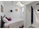 Bright bedroom with skylight next to bathroom with blue tiled shower at 1078 Piedmont Ne Ave # 203, Atlanta, GA 30309