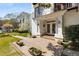 Charming home featuring a brick entryway, white columns, and a small balcony at 1078 Piedmont Ne Ave # 203, Atlanta, GA 30309