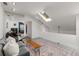 Bright living room featuring skylight, mirrored wall and blue accent wall at 1078 Piedmont Ne Ave # 203, Atlanta, GA 30309