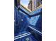 Stylish blue tiled shower with built-in seat and a skylight offering exterior views at 1078 Piedmont Ne Ave # 203, Atlanta, GA 30309