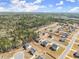 An aerial view displays a well-planned residential community with green spaces and manicured lawns, offering a serene setting at 125 Whitman Grv, Fayetteville, GA 30215