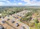 Aerial view of homes in a well-planned community surrounded by lush woodlands at 125 Whitman Grv, Fayetteville, GA 30215