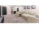 Finished basement with large sectional sofa and recreational amenities at 125 Whitman Grv, Fayetteville, GA 30215