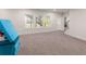 Finished basement offers ample space, natural light, and easy outdoor access at 125 Whitman Grv, Fayetteville, GA 30215