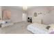 bedroom with floral wall decals, neutral carpet and cute decor at 125 Whitman Grv, Fayetteville, GA 30215