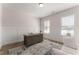 Bright home office with board and batten detail, wood floors, and large desk at 125 Whitman Grv, Fayetteville, GA 30215