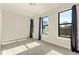 Bright bedroom with carpet, windows, and curtains at 2030 Main Nw St # 207, Atlanta, GA 30318