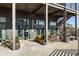 Outdoor seating area of a building, featuring plants, seating, and stairway at 2030 Main Nw St # 207, Atlanta, GA 30318