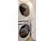Modern stacked washer and dryer unit for convenient laundry access at 2030 Main Nw St # 207, Atlanta, GA 30318