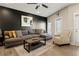 Cozy living room with comfortable seating, modern decor, and natural light from nearby windows at 2030 Main Nw St # 207, Atlanta, GA 30318