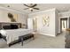 Spacious main bedroom with neutral décor features carpet, windows, and artwork at 2030 Main Nw St # 207, Atlanta, GA 30318