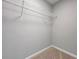 A view of the closet interior space featuring shelving and neutral walls at 7229 Georges Way, Morrow, GA 30260
