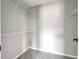 Walk-in closet with neutral carpet and wire shelving offers ample storage at 7229 Georges Way, Morrow, GA 30260