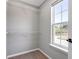 A walk-in closet with bright natural light and wire shelving at 7229 Georges Way, Morrow, GA 30260