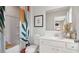 Bathroom featuring shower/tub combo with bright, decorative shower curtain and white vanity at 113 Chestnut Trce # 8, Hapeville, GA 30354