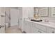Elegant bathroom with double vanity, white cabinetry, and modern fixtures offering a spa-like experience at 113 Chestnut Trce # 8, Hapeville, GA 30354