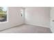 A cozy bedroom with two windows and neutral carpeting at 113 Chestnut Trce # 8, Hapeville, GA 30354