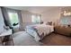 Bright bedroom featuring a large window, comfortable bed, and stylish decor creating a relaxing atmosphere at 113 Chestnut Trce # 8, Hapeville, GA 30354