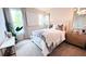 Bright bedroom featuring a large window, comfortable bed, and stylish decor creating a relaxing atmosphere at 113 Chestnut Trce # 8, Hapeville, GA 30354