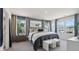 Spacious main bedroom with large windows, stylish decor, and plush carpeting at 113 Chestnut Trce # 8, Hapeville, GA 30354