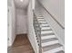Modern staircase featuring wood treads and neutral decor at 113 Chestnut Trce # 8, Hapeville, GA 30354
