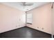 Empty bedroom featuring dark wood floors and ceiling fan at 115 Oak Grove Pl, Acworth, GA 30102