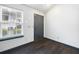 View of front door and beautiful flooring inside the home at 115 Oak Grove Pl, Acworth, GA 30102
