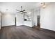 Spacious living room boasting sleek flooring, neutral walls, and modern lighting fixtures at 115 Oak Grove Pl, Acworth, GA 30102
