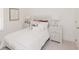 Comfortable bedroom with ample natural light, neutral decor, and stylish furnishings at 2698 Ne Almand Ne Ln, Conyers, GA 30013