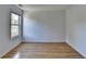 Bright bedroom with hardwood floors and a window letting in natural light at 3517 Harvest Ridge Ln, Buford, GA 30519