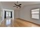 Bright and airy bedroom with vaulted ceiling, ceiling fan, and a large window at 3517 Harvest Ridge Ln, Buford, GA 30519