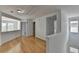 Open hallway with hardwood floors and plenty of natural light at 3517 Harvest Ridge Ln, Buford, GA 30519