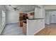 Spacious kitchen with an island, granite countertops, and stainless steel appliances at 3517 Harvest Ridge Ln, Buford, GA 30519