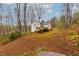 Home with a beautiful, gently sloping backyard at 67 Red Top Cir, Emerson, GA 30137