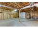 Unfinished basement provides ample storage space and a garage door exit at 67 Red Top Cir, Emerson, GA 30137