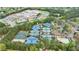 A sprawling residential area with tennis courts, schools, and a community pool surrounded by lush trees at 2005 Westbourne Way, Alpharetta, GA 30022