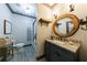 Bathroom featuring wood look floors, modern vanity, and rustic decor at 2005 Westbourne Way, Alpharetta, GA 30022